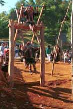 to Jpeg 39K U Lo-Akha boys on the swing at the entrance to a village in the hills around Chiang Rai 8812p34.jpg