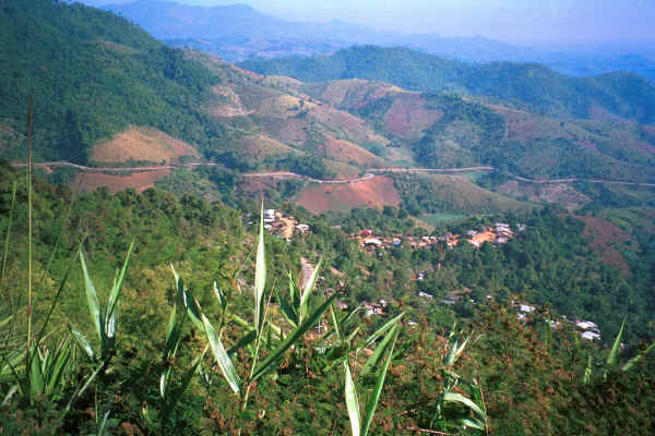 Looking down from the edge of a U Lo-Akha village down onto a Mien (Yao) village below in the hills around Chiang Rai 8812q01.jpg
