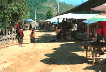 to Jpeg 24K The road through a Yao village in the hills around Chiang Rai 8812q29.jpg