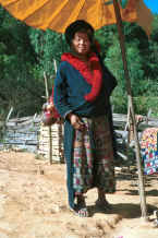 to Jpeg 43K A Yao woman in a village in the hills around Chiang Rai 8812q30.jpg