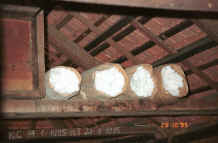 to Jpeg 25K Cotton bolls stored in bags in the roof of a Black Thai house on the way to Dien Bien Phu from Son La, Lai Chau Province 9510E09.JPG