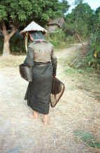 to Jpeg 40K Black Thai woman returning from fishing - she had maggots in her basket.  Dien Bien Phu, Lai Chau Province. 9510E29.JPG