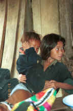 to Jpeg 33K Black Hmong girl looking after a young boy in the hills around Sa Pa, Lao Cai Province 9510J07.JPG