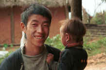 to Jpeg 22K Black Hmong father and young son in the hills around Sa Pa, Lao Cai Province. 9510J09.JPG