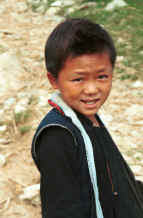to Jpeg 24K Black Hmong boy walking home from school in the hills around Sa Pa, Lao Cai Province 9510K11.JPG