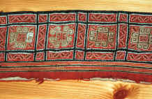 to Jpeg 53K The embroidered underside of a collar cut off a Black Hmong sleeveless jacket purchased from a Black Hmong woman in Sa Pa, Lao Cai Province 9511A25.JPG