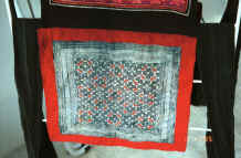 to Jpeg 37K Batik, appliqu detail  from Black Hmong baby carrier collected in Sa pa, Northern Vietnam 9511a19