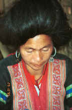 to Jpeg 30K Red Hmong woman in a village in Lai Chau province, northern Vietnam 9510f30.jpg