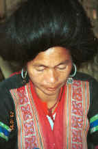 to Jpeg 30K Red Hmong woman in a village in Lai Chau province, northern Vietnam 9510f30.jpg