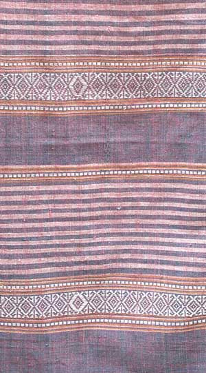 Jpeg 44K mc7 The finished woven fabric has more of an unevenness to the weave and colors which is due to its hand-made nature. The Mai Chau valley, Hoa Binh Province, northern Viet Nam.