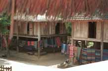 to Jpeg 46K Southern White Thai weavings hanging outside houses in In Ban Lac village in the Mai Chau district, Hoa Binh (Ha Son Binh) Province 9510A15T