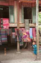 to Jpeg 61K Southern White Thai weavings hanging outside houses in In Ban Lac village in the Mai Chau district, Hoa Binh (Ha Son Binh) Province 9510A17T