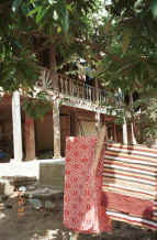 to Jpeg 53K Southern White Thai (Tai Dam) cloth for blankets or pha lai or, in this case as it is red, it may be called pha daang Ban Lac village, Mai Chau District in Hoa Binh Province near the border with the north-western part of Thanh Hoa Province in north west Vietnam 9510A22.JPG