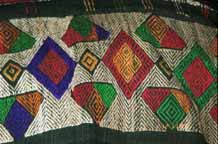 to Jpeg 94K Detail of an embroidered hem of an old Southern White Thai sarong collected in Ban Lac village in the Mai Chau district, Hoa Binh (Ha Son Binh) Province, Vietnam 9511A34T